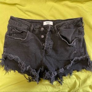 Black distressed shorts